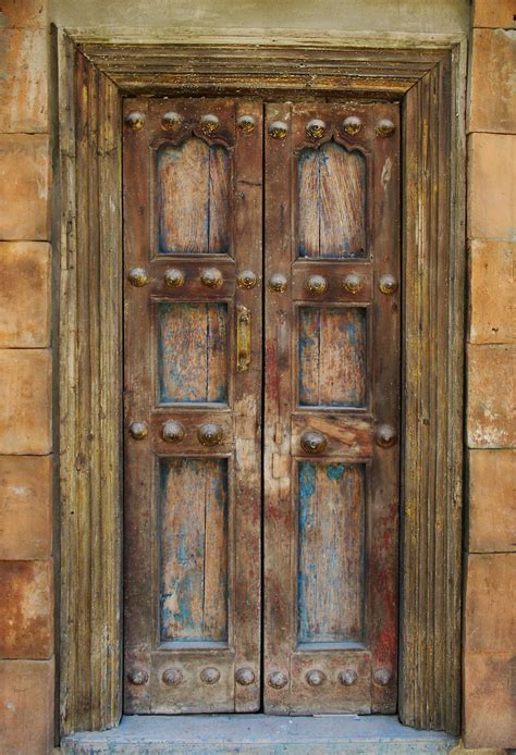 A Barrier or Protection? Exploring the Dual Nature of a Closed Wooden Door