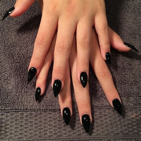 Accessorize Your Stylish Jet Black Nails: Nail Art Inspiration