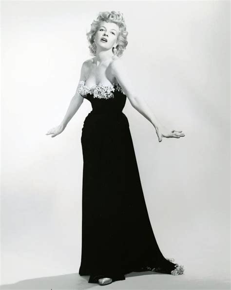 Beauty and Elegance: Exploring the Timeless Allure of Corinne Calvet's Chic Physique