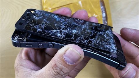 Broken Connections: Exploring the Symbolism Behind a Shattered Mobile Device