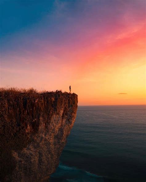 Captivating Sunset Views from the Edge of a Majestic Cliff