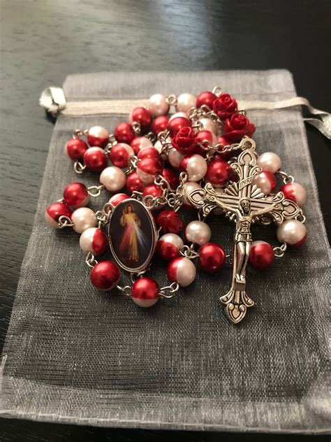 Decoding Visions of the Crimson Rosary: Insights from the Divine