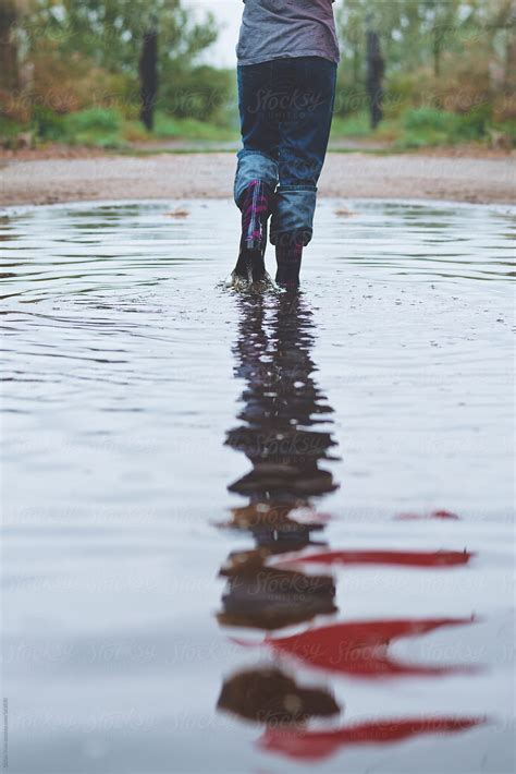 Diving into the Mesmerizing World of Walking Through Puddles