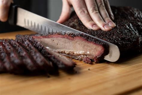 Diving into the Tender World of Brisket: Unveiling the Art of Preparing Smoked Beef Brisket