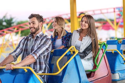 Double the Fun: Enjoying Roller Coasters with a Friend