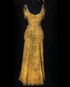 Drawing Inspiration: Iconic Moments of the Shimmering Gold Gown in Pop Culture