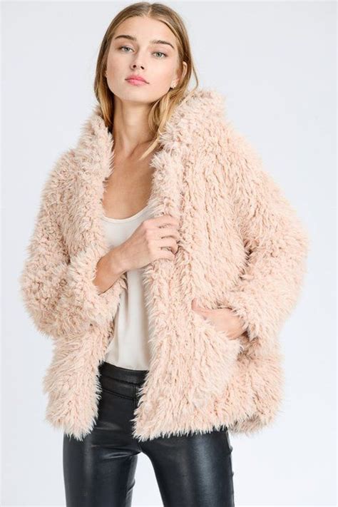 Dress to Impress: Experiencing the Allure of a Blush-colored Fuzzy Jacket