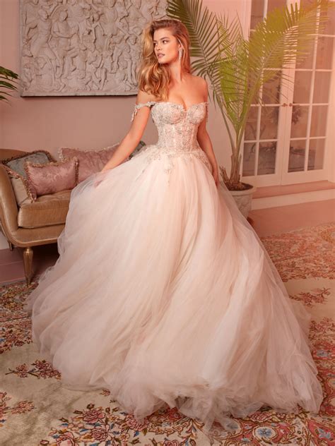 Embellishments and Details: Adding Flair to Your Blush Bridal Gown