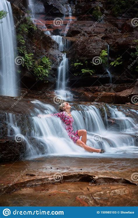 Experience the exhilaration of showering beneath a majestic cascade