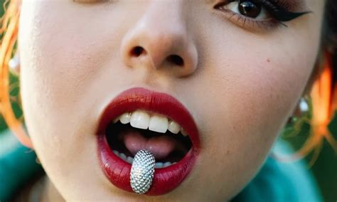 Exploring the Cultural Significance of Dreams Involving Tongue Piercing
