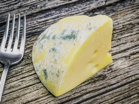 Facing the Spoiled: Overcoming Challenges Symbolized by Moldy Cheese Dreams