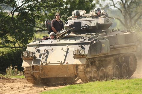 Indulge in the Excitement of Riding in a Military Tank and Experience the Power of the Machine