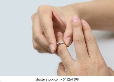 Letting Go or Holding On: Decoding the Message When Dreams Involve Taking off Wedding Rings