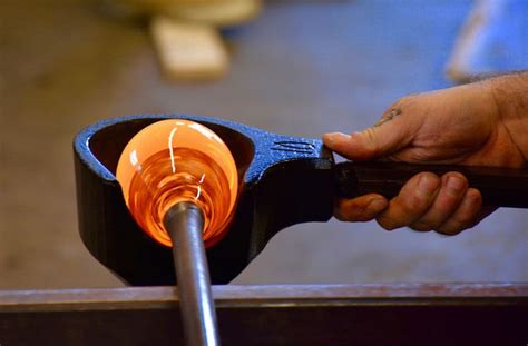 The Intricate Process of Crafting Molten Glass Sculptures