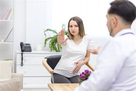 The Intriguing Fascination of Reaching Out to a Expecting Abdomen