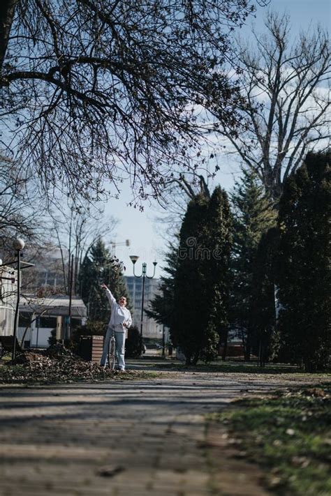 The Tranquil Beauty of a Leisurely Walk in a Park