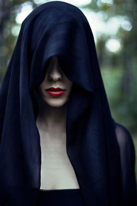 The Veiled Woman: Revealing the Secrets of the Mysterious Lady Cloaked in Darkness