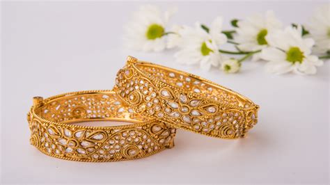 Unearthing the Fascinating History of Elegant Golden Bangles