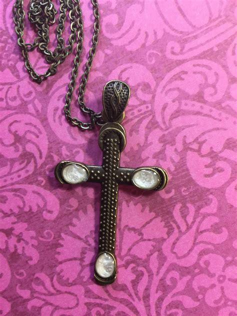 Unique and Artistic Cross Necklace Designs for Statement Makers