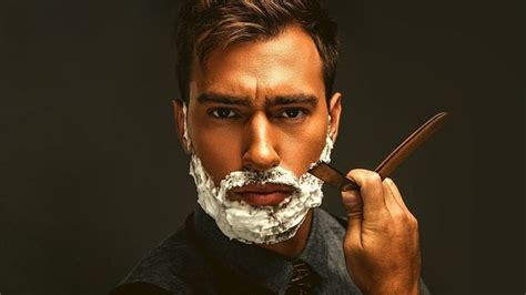 Unraveling the Significance of a Pensive Gentleman Engaged in Grooming Rituals