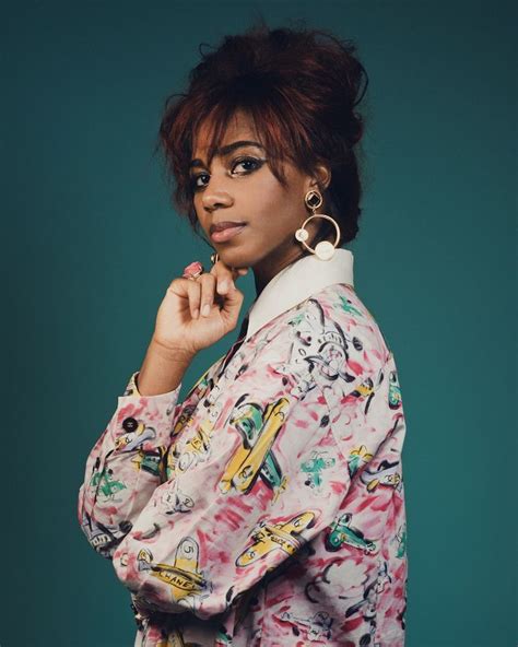 Unveiling Santigold: Exploring Her Unique Style and Visual Aesthetics